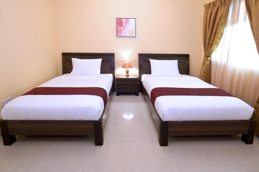Tiger Home Hotel Apartments Маскат Экстерьер фото